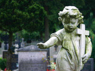 A memorial statue in a cemetery