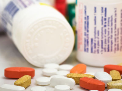 Assorted pharmaceuticals and prescription pill bottles