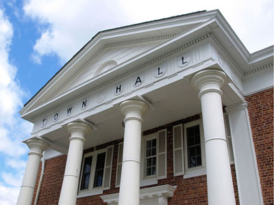 Municipalities: The exterior of a town hall building
