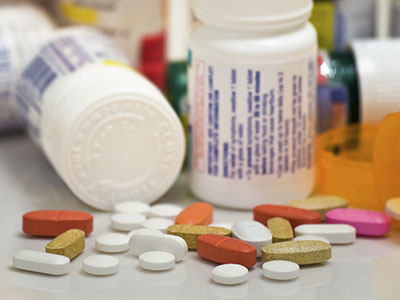 Expired Pharmaceutical Waste: Assorted pharmaceuticals and prescription pill bottles